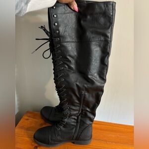 Black leather tie up boots